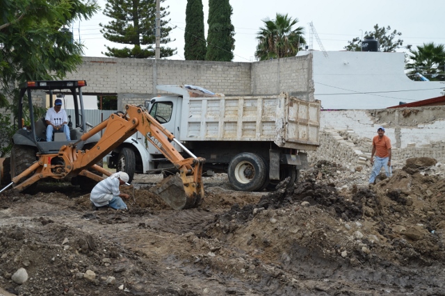 The white truck in this picture actually fell into a hole earlier. Thank goodness nothing got broken. Like an axle.