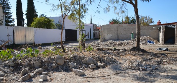 No more outside wall on the lake side of the building. But plenty of rubble!