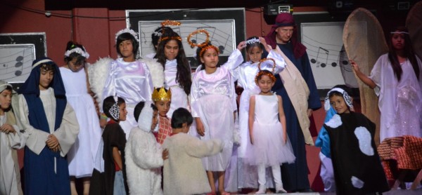 Shepherds, angels, sheep . . . they're all there to worship.