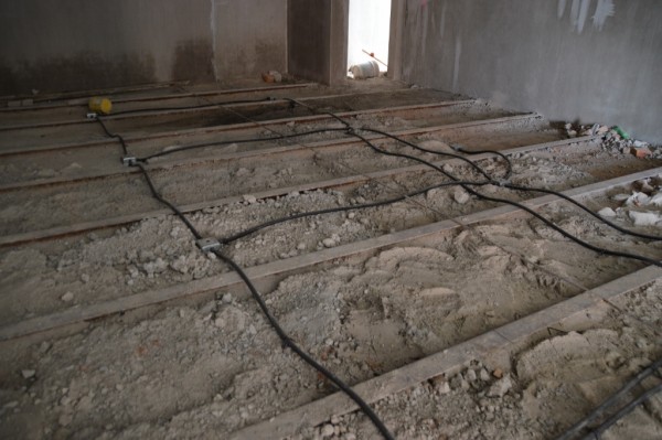 These electrical boxes are in the floor of the second floor -- for the room below.