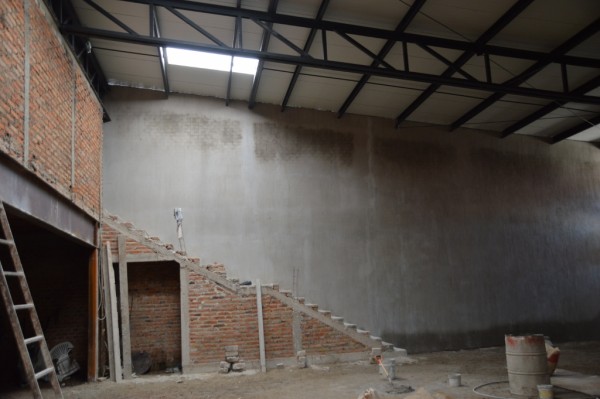 There's now another stairway to the "grand hall" upstairs. This is in the sanctuary. Note the storage underneath -- or perhaps the area for the soundboard. And the wall behind has been plastered.