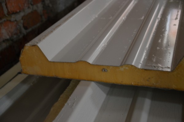 This is what the roofing looks like up close. It's very sturdy. The installers actually jump on it to lock it into place.